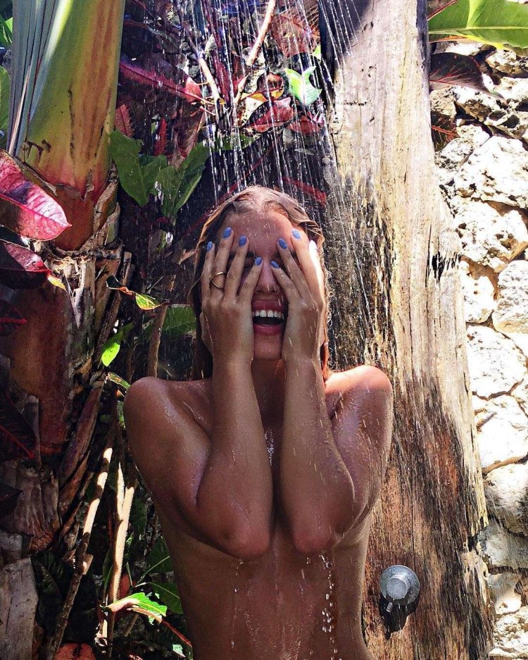 Girl in the summer shower