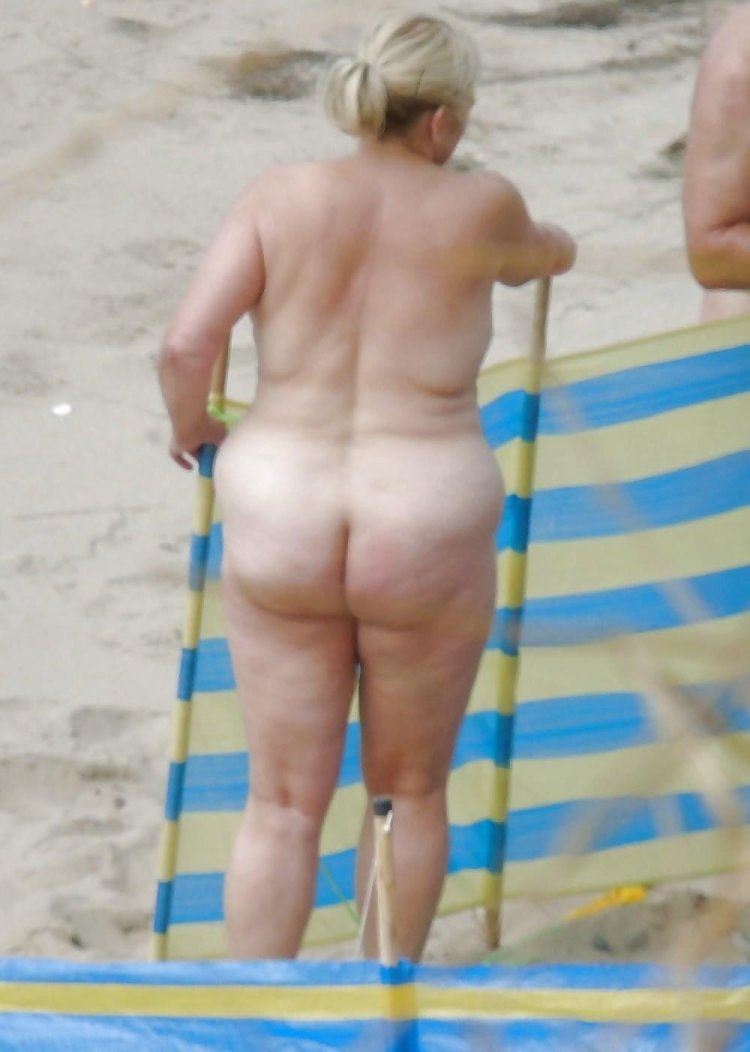 Burnts of naked old women on the beach