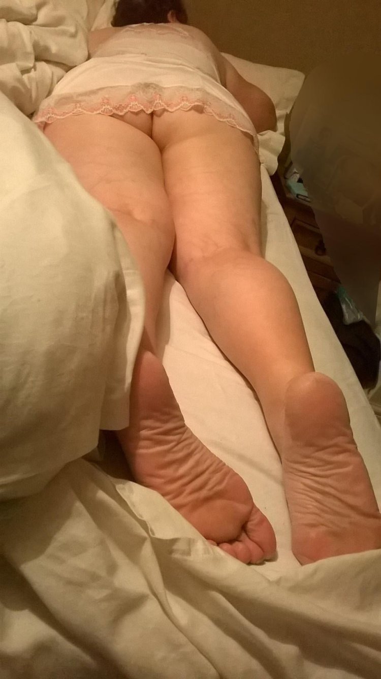 A naked wife is sleeping