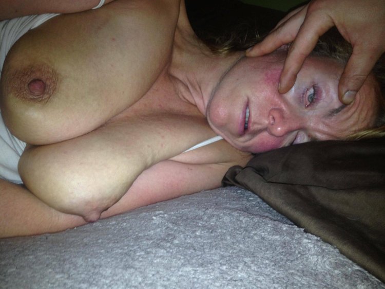 Sleeps naked with big tits