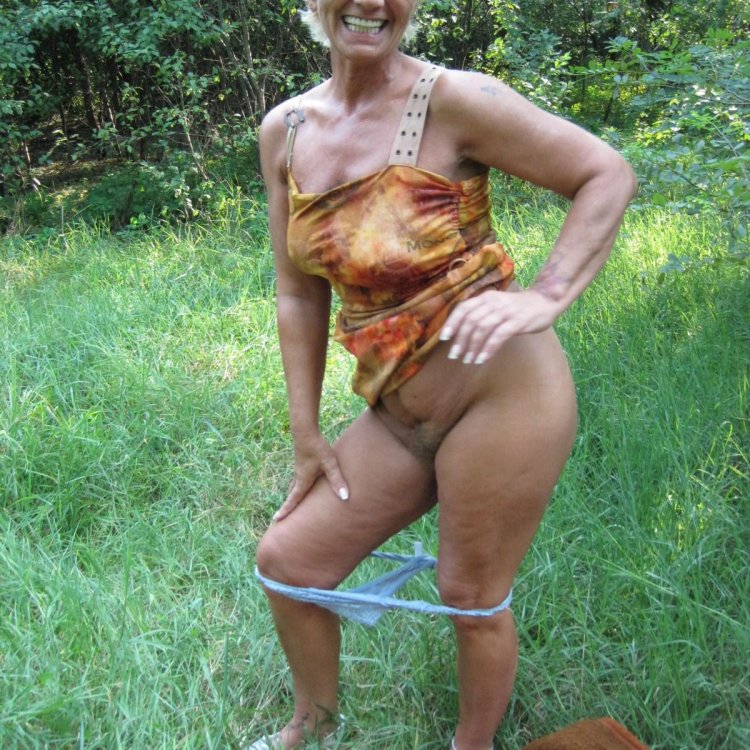 Naked mature on the shore