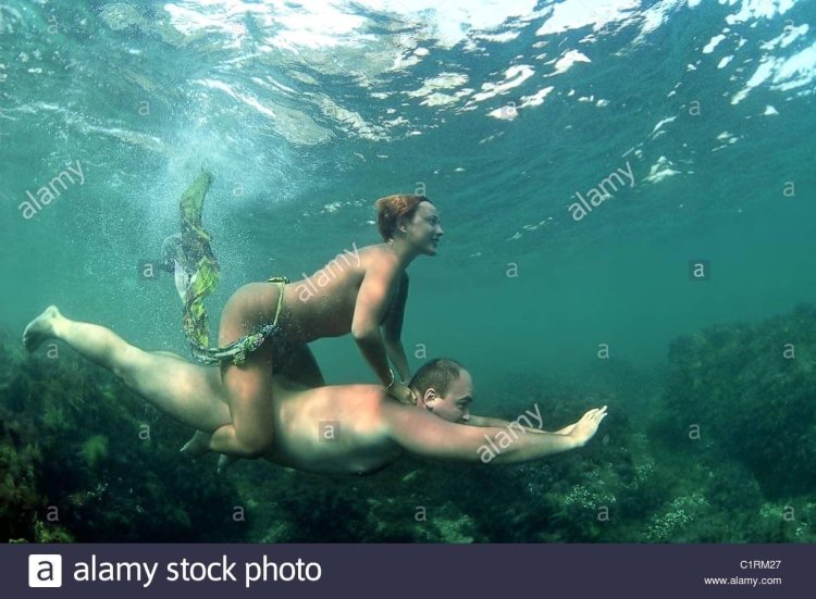Naked girls in transparent water
