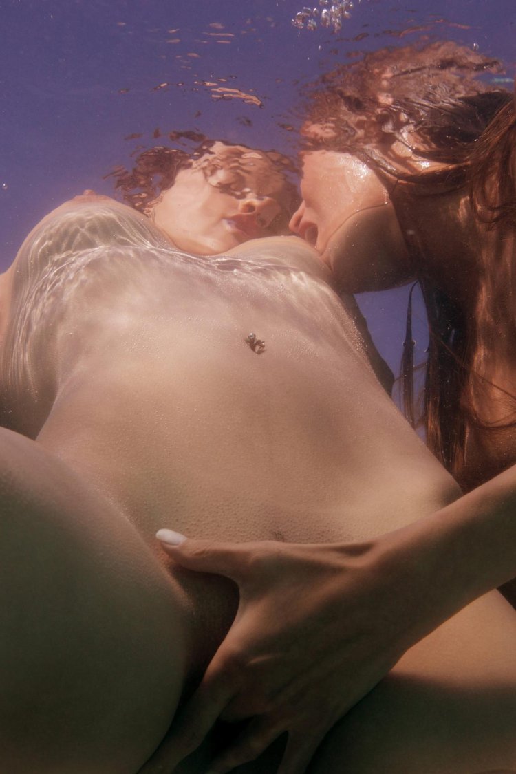Naked beauties underwater