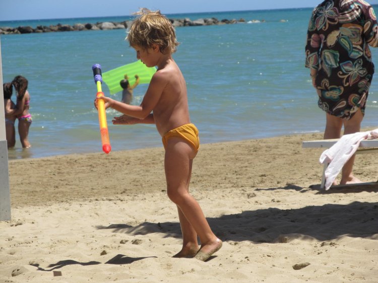 Naked kids on the beach