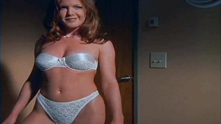 Kelly Preston in his youth swimsuit