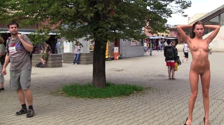 The girl undressed on street spore