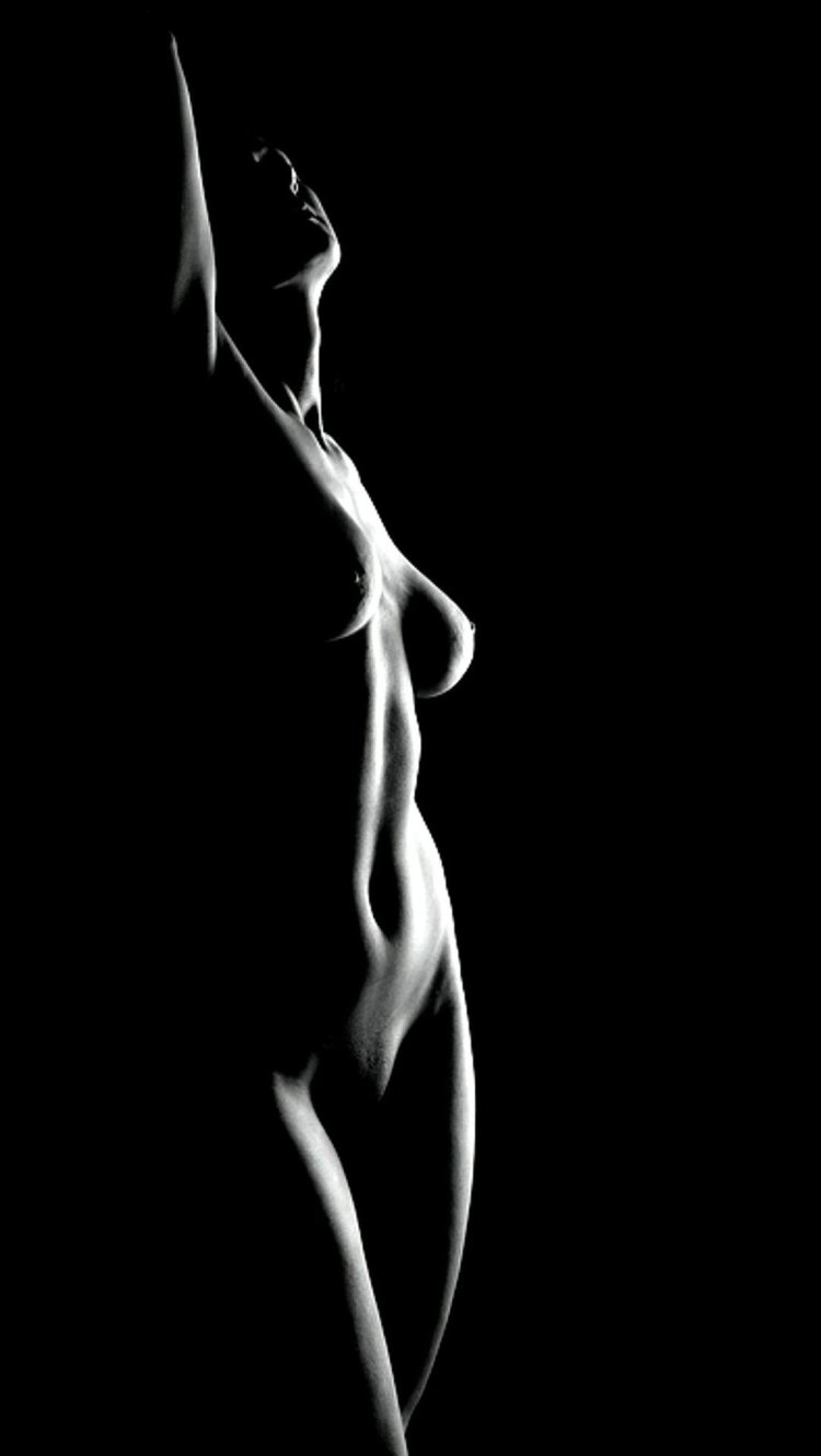 The silhouette of a naked woman