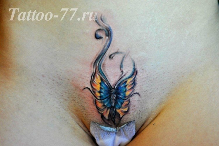 Tattoo butterfly on the stomach