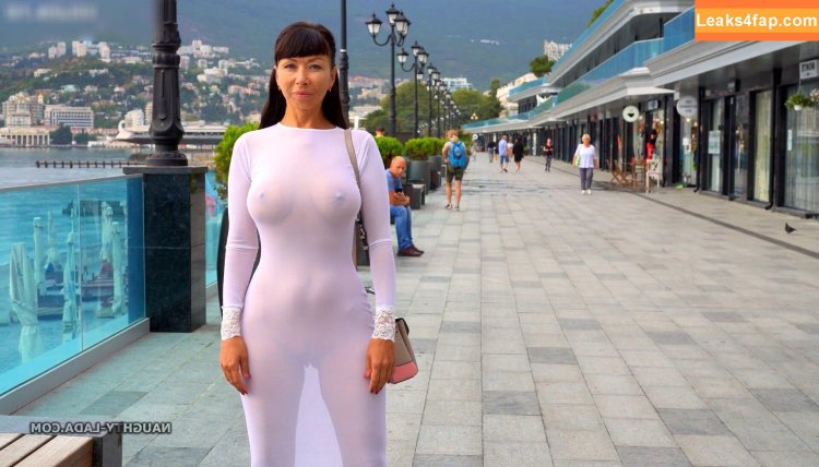 In a transparent dress