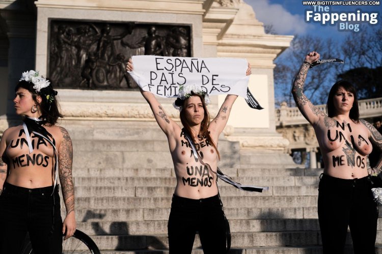 Activists with naked boobs