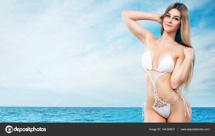 Girl in a swimsuit at sea