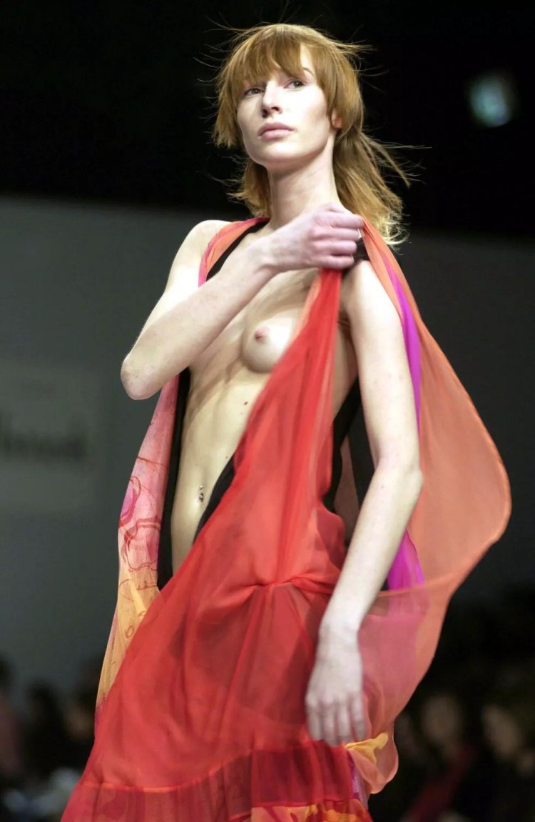 Naked fashion model on the catwalk