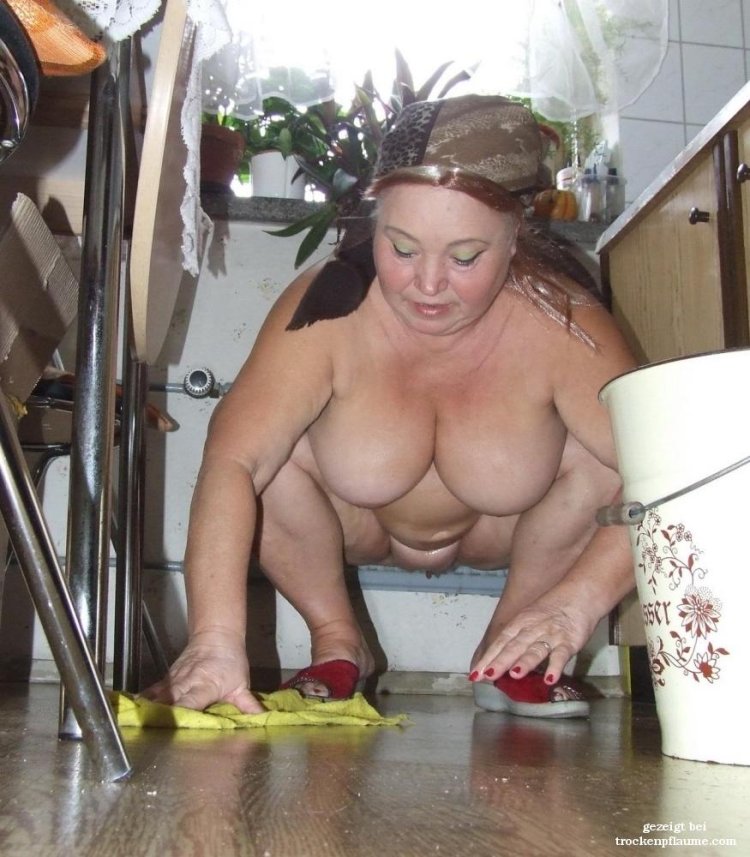 Women wash the floor without panties