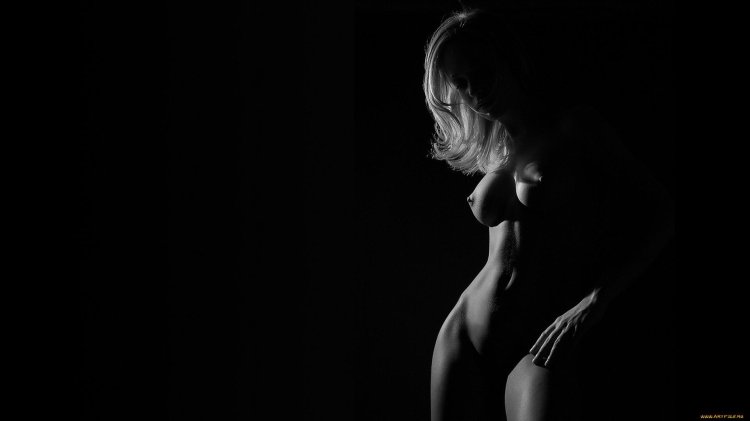 The silhouette of a naked girl