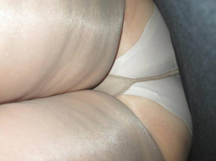 Panties under the skirt from below