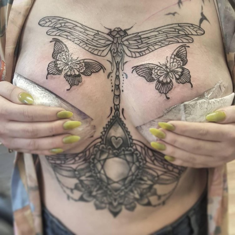 Tattoo butterfly on the chest