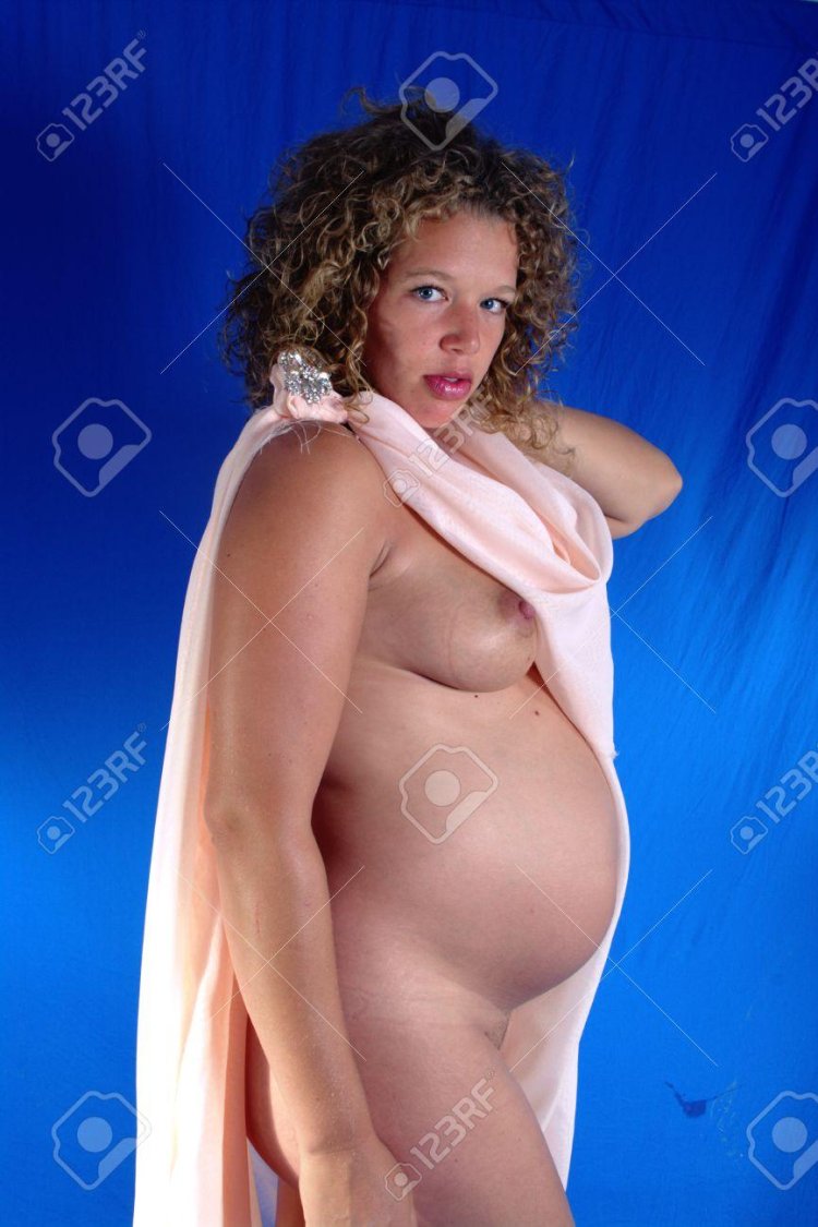The woman is pregnant