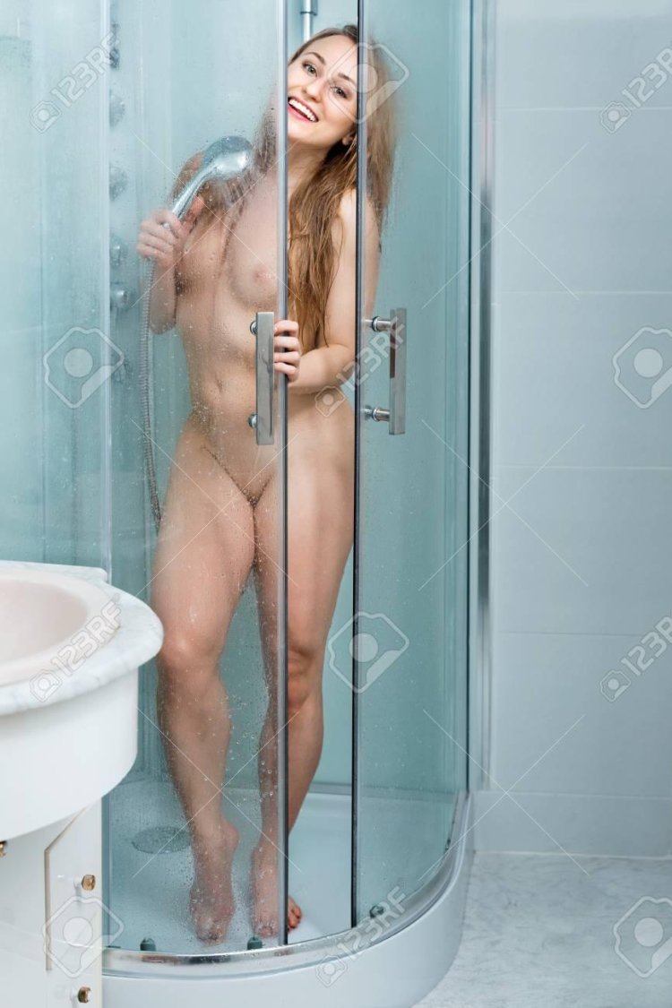 Naked wife poses in the shower