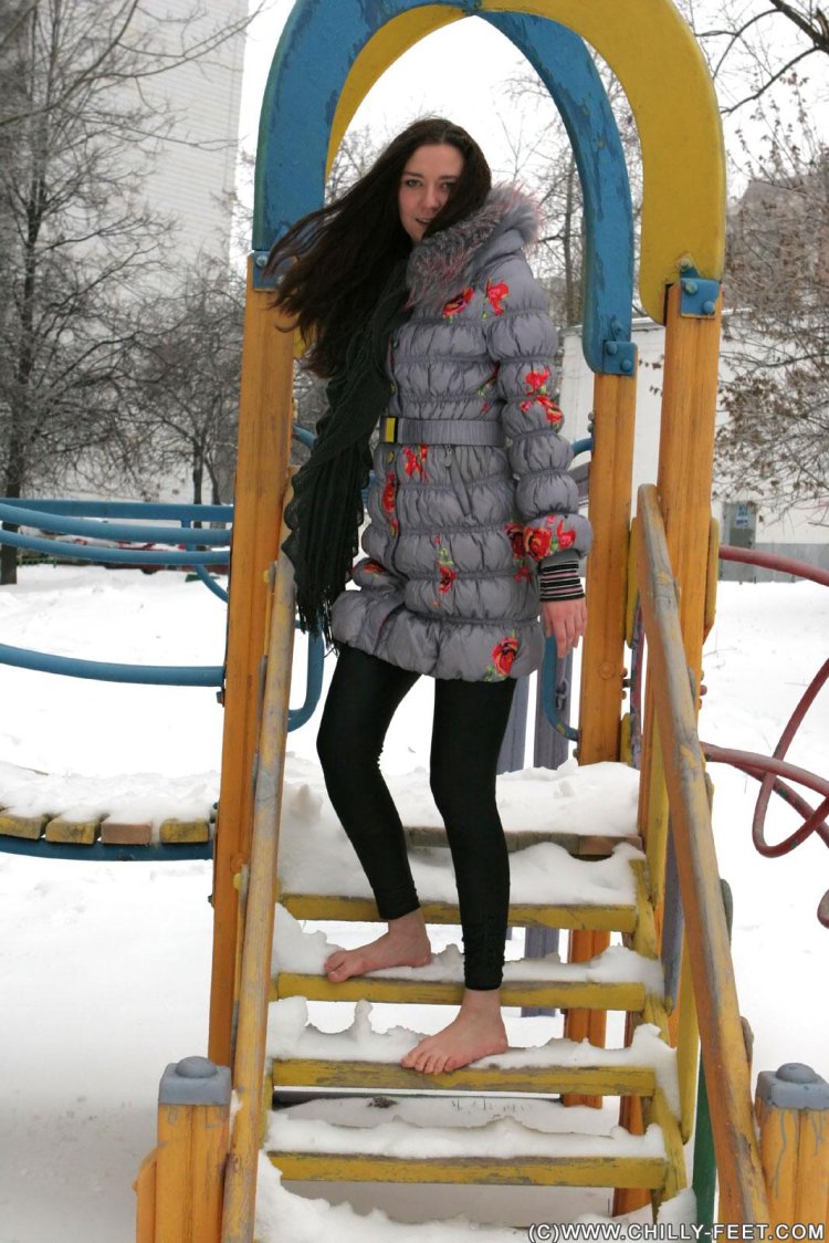 Girl barefoot in winter