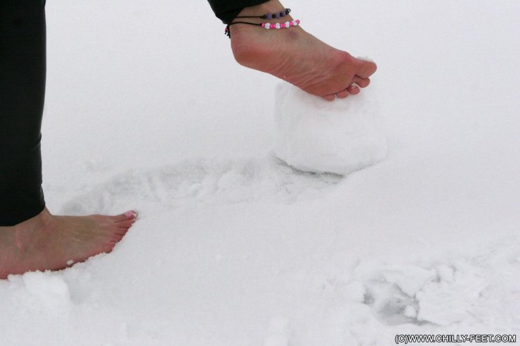 Olga Gavva barefoot in the snow