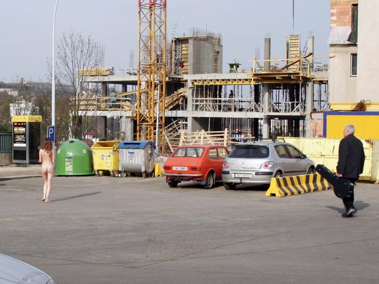 Naked on the street in city center