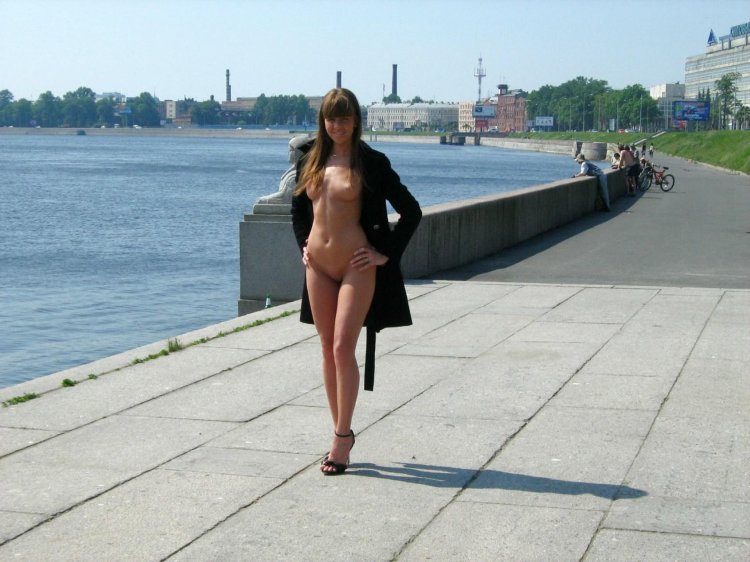 Girl naked on the embankment