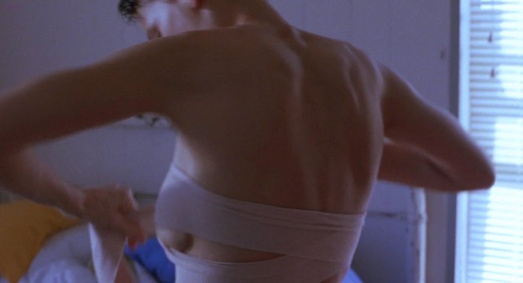 Actress Sigurny Weaver in a swimsuit