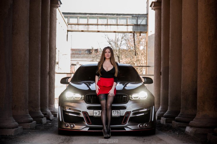 Sonya Temnikova with a BMW X car