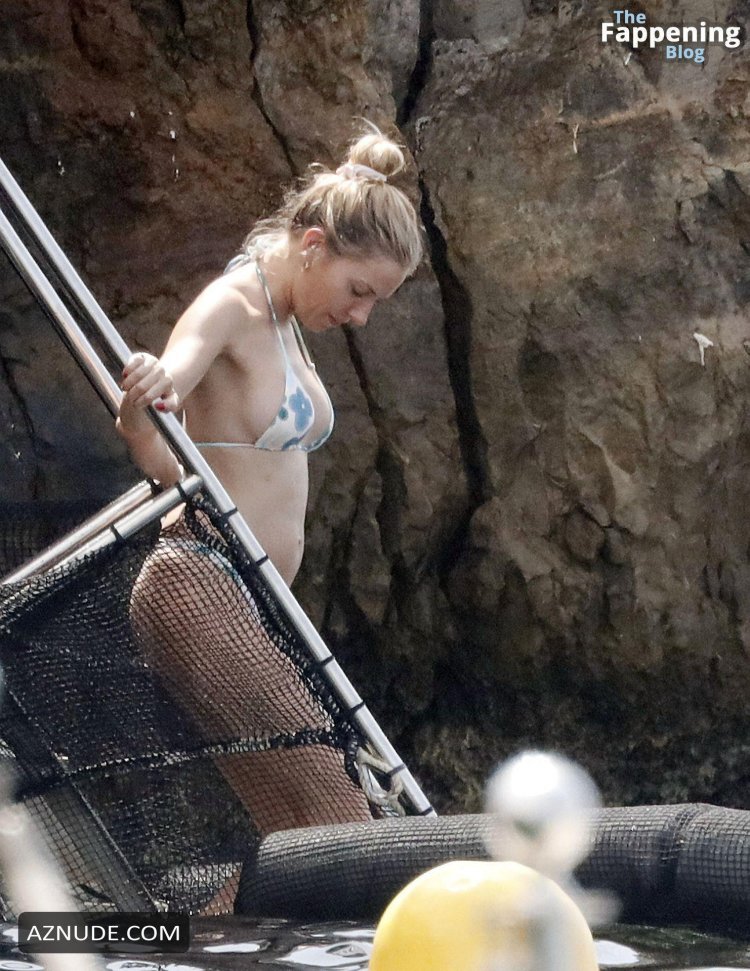 Sienna Miller in a swimsuit