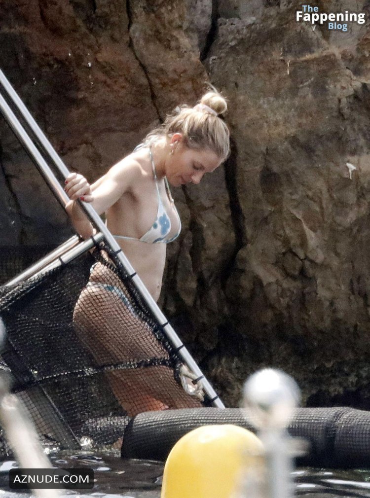 Sienna Miller in a swimsuit