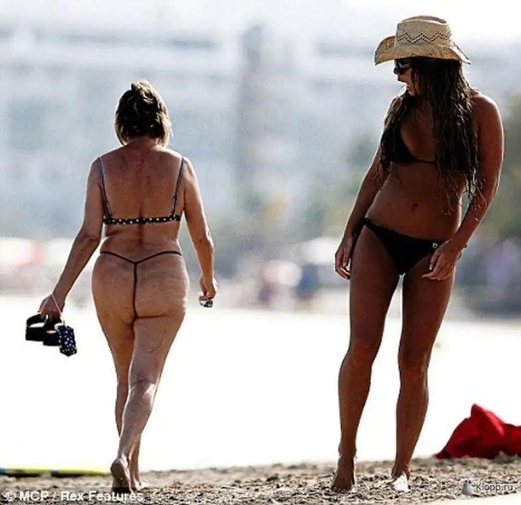 Women in thongs on the beach