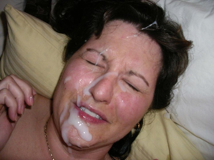 Cumshot an elderly woman on the face