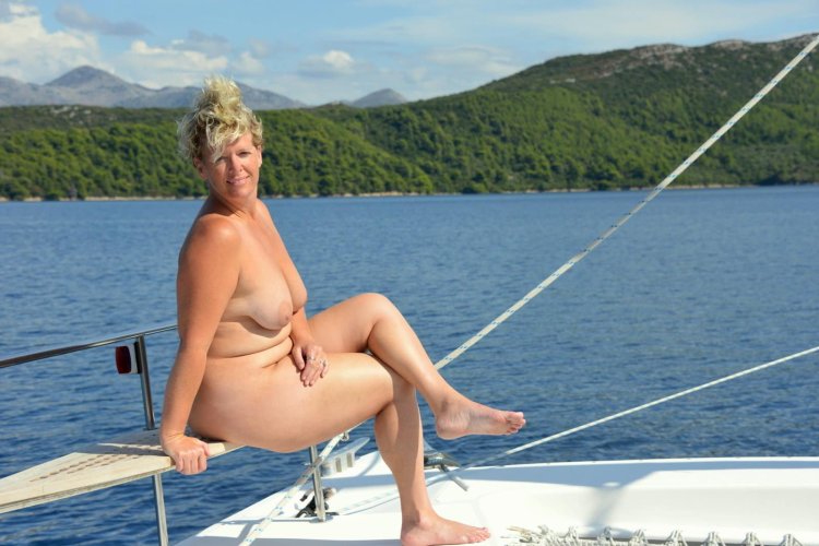 Naked adult women on a yacht