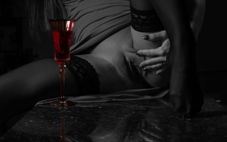 Erotic photo shoot with a glass