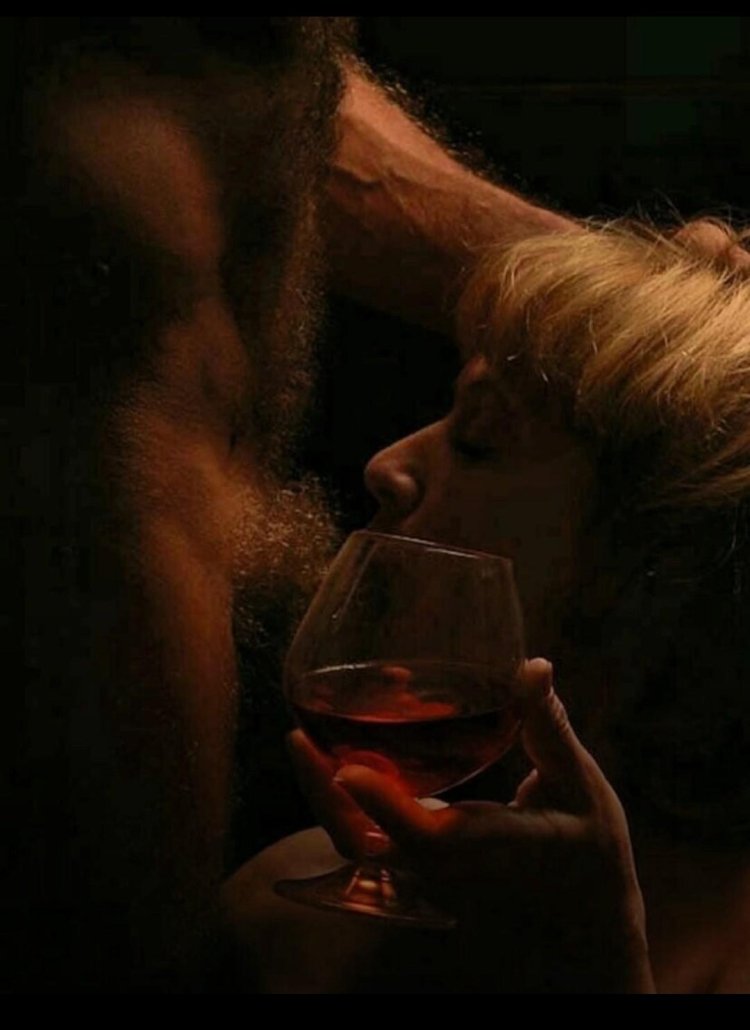 Pornographic photo shoot with wine