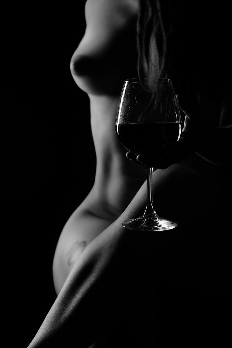 Erotic photo shoot with wine