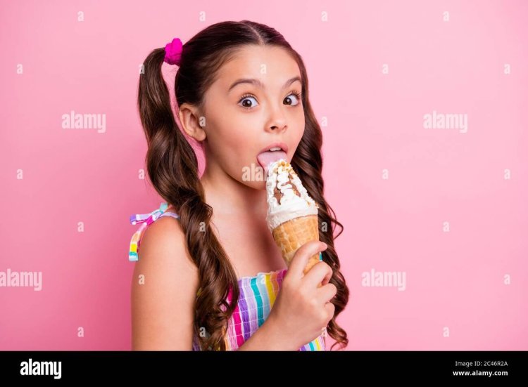 Girl licks ice cream