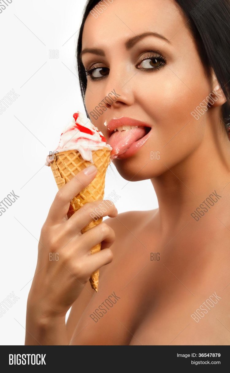 A woman eats ice cream