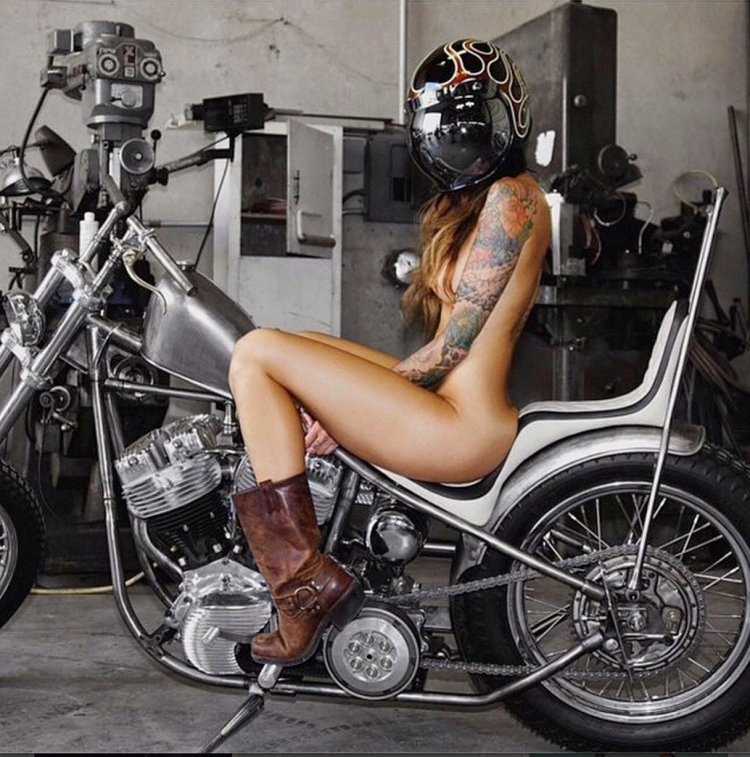 Naked girl on a motorcycle