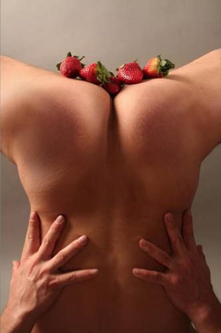 Erotic photo shoot with strawberries
