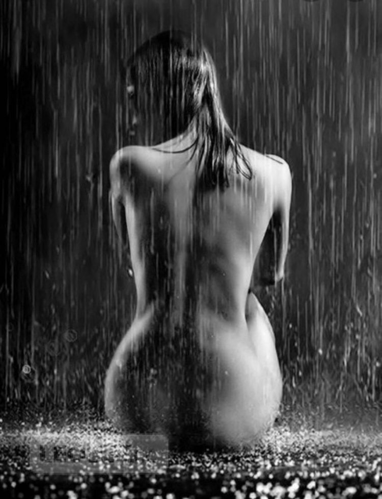 Naked women in the rain