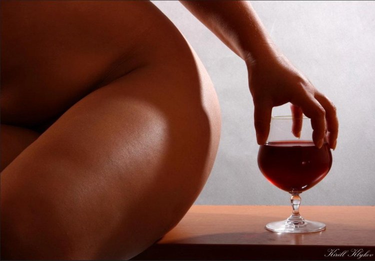 Erotic photo shoot with wine