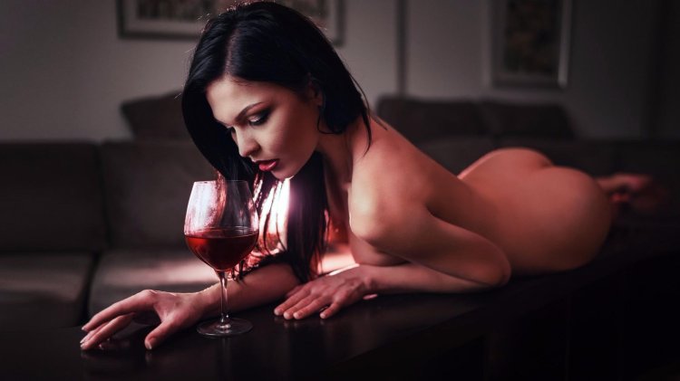 Erotic photo session with wine