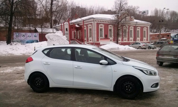 White Kia Cerato Black Stamps