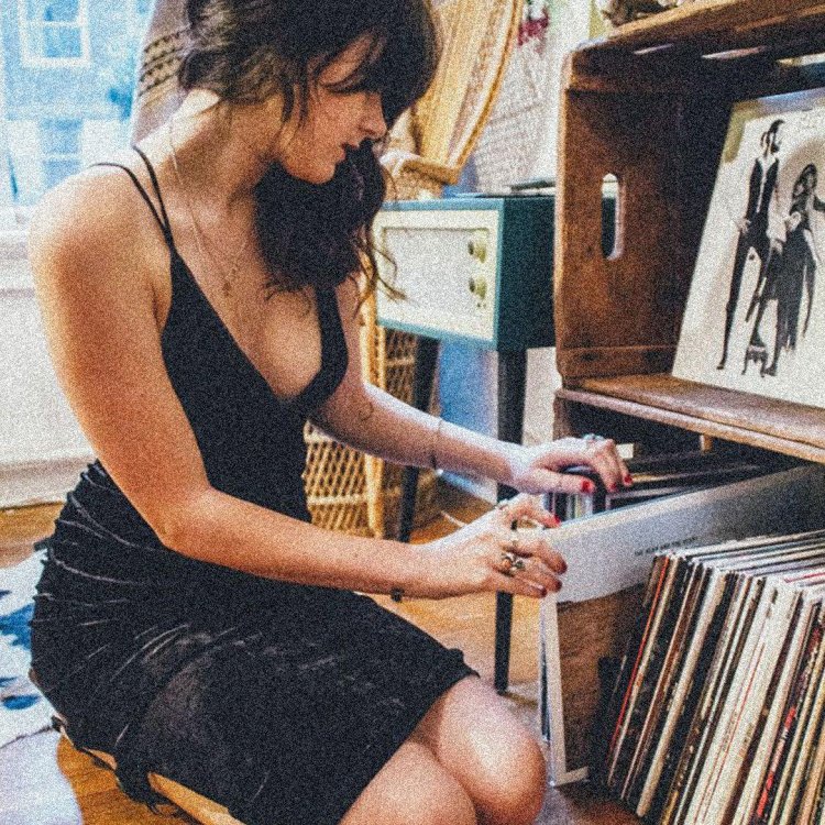 A girl with vinyl plate