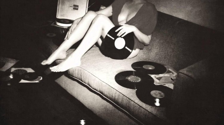 Girl with vinyl player