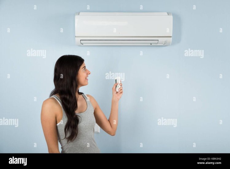 Woman with a remote control