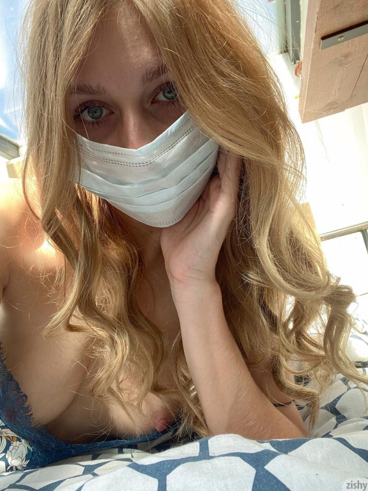 Naked in a medical mask