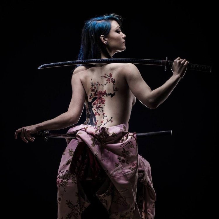 Naked woman with a katana