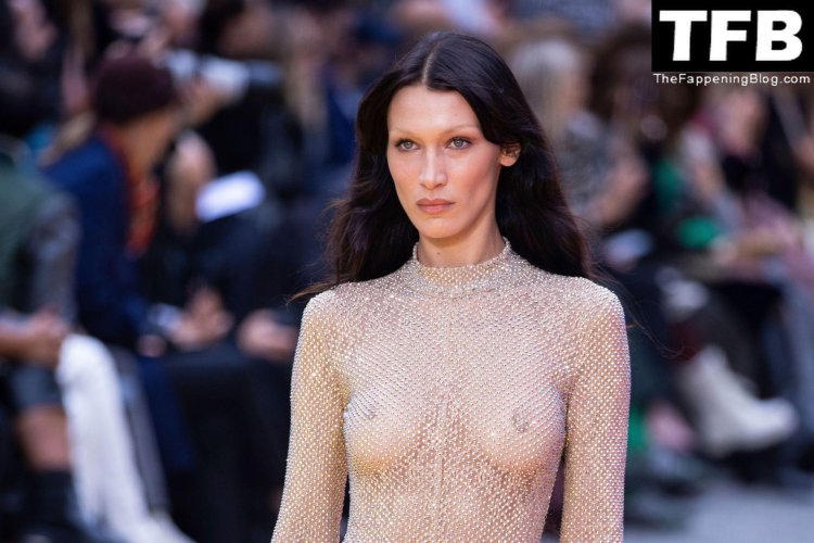 Showing a fashion with bare breasts